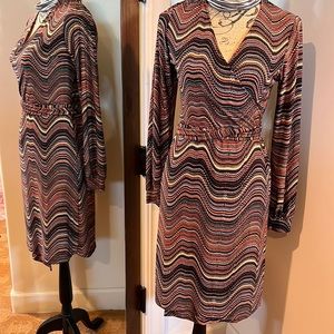 Veronica’s brown patterned dress wrap